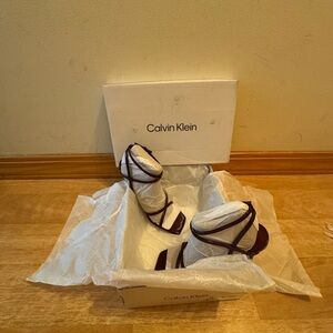 Calvin Klein Tegin dark red dressy strappy heels 
6.5